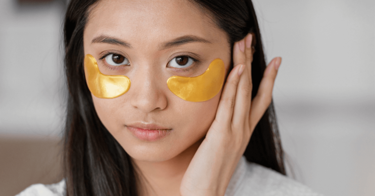 woman with patches under her eyes