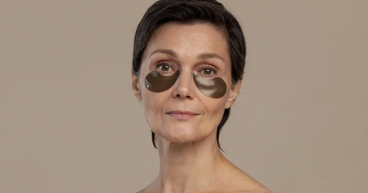 woman with patches under her eyes